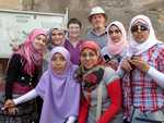 Mayling and John with schoolgirls at Saladin Citadel (12th century AD)