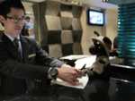 Hong Kong- I'm checking us into the hotel.
